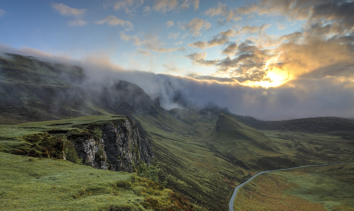 Scottish Highlands glen with misty mountains